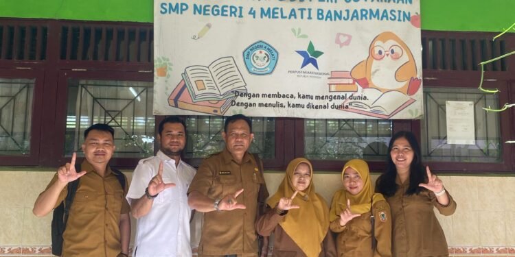 Dispersip Kalsel Sosialisasikan SNP ke SMP Negeri 4 Banjarmasin
