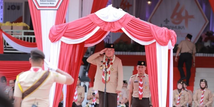 Kolaborasi untuk Membangun Ketahanan Bangsa, Ketua Mabida Pramuka Kalsel H. Muhidin Pimpin Apel Besar Hari Pramuka ke-64 di Tabalong
