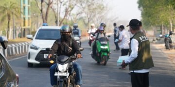 Pemkab Tanah Bumbu Bagikan Masker Gratis, Lindungi Warga dari Kabut Asap Karhutla